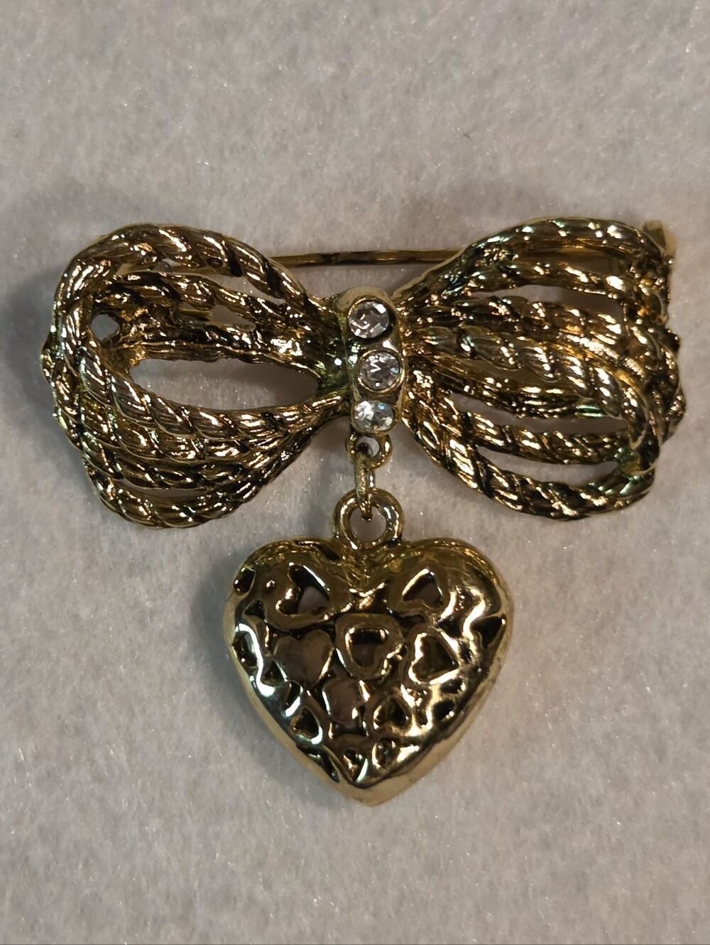 Vintage Gold-tone Rhinestone Bow Brooch with Hanging Puff Heart Charm
